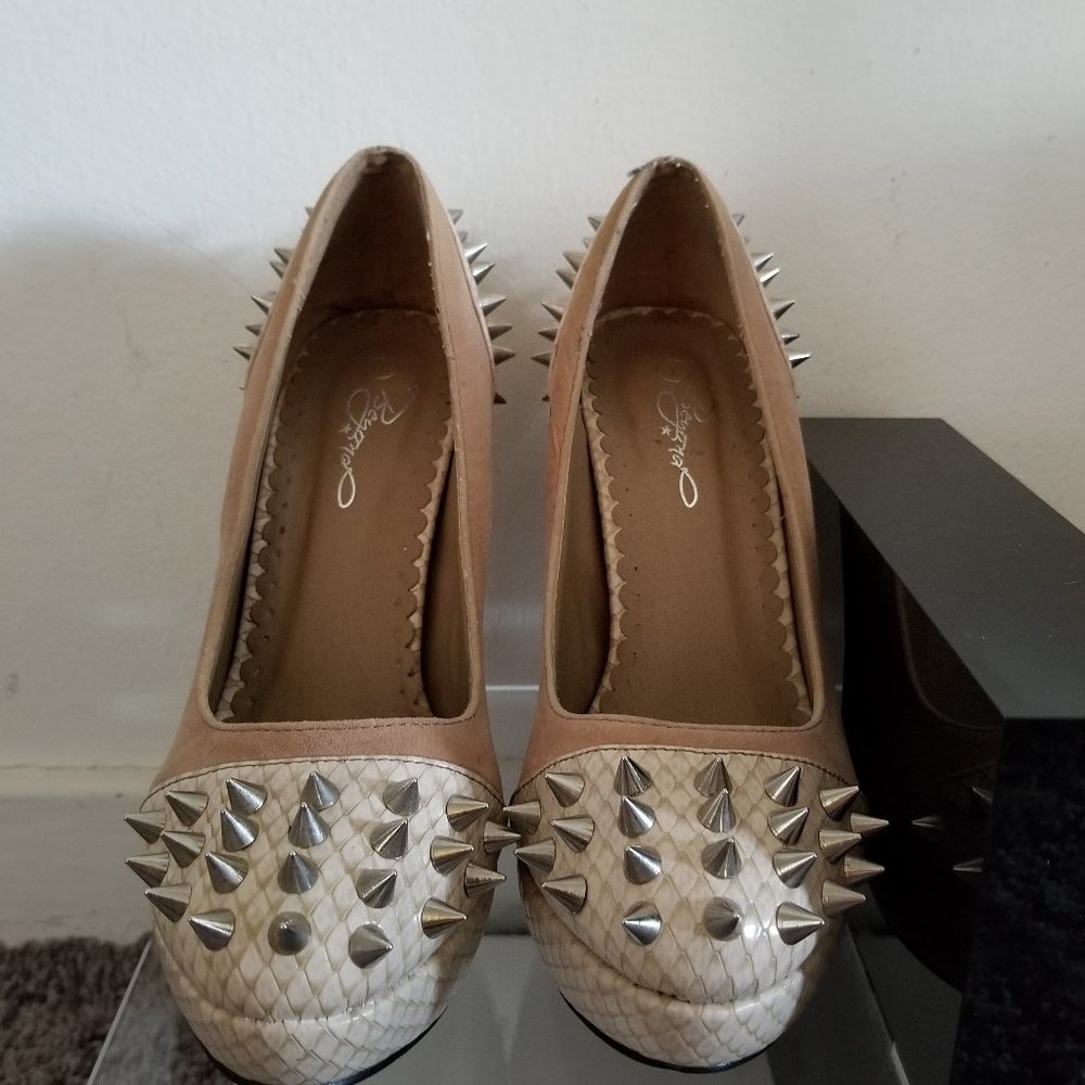 Spikey red bottom heels